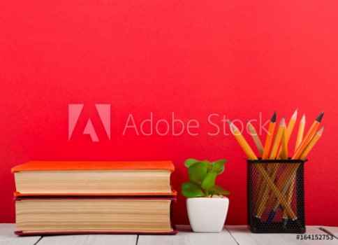 Picture of Education and wisdom concept - open book on wooden table color background